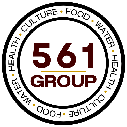 The 561 Group logotype: the words 561 and Group stacked horizontally in dark red, with a yellow line between them, inside two concentric black circles in which the words food, water, health, culture, are repeated twice.